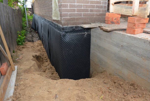Happy homeowners after waterproofing job in Dolomite